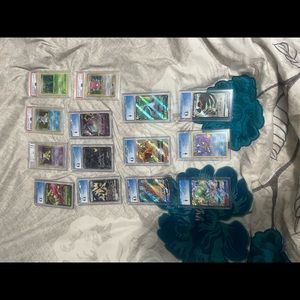 All grades Pokémon cards; some vintage and some new.